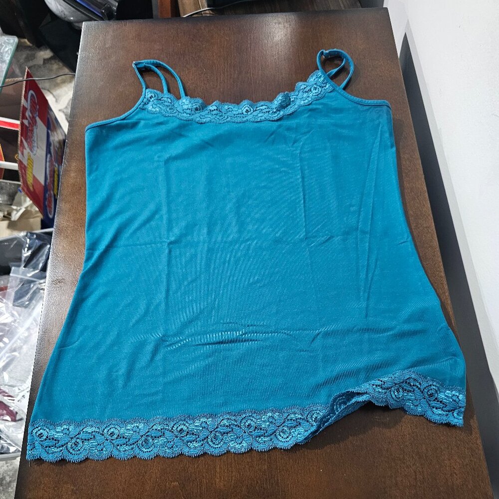 Reitman slip blue in color Size small Pattern at top and bottom of slip
